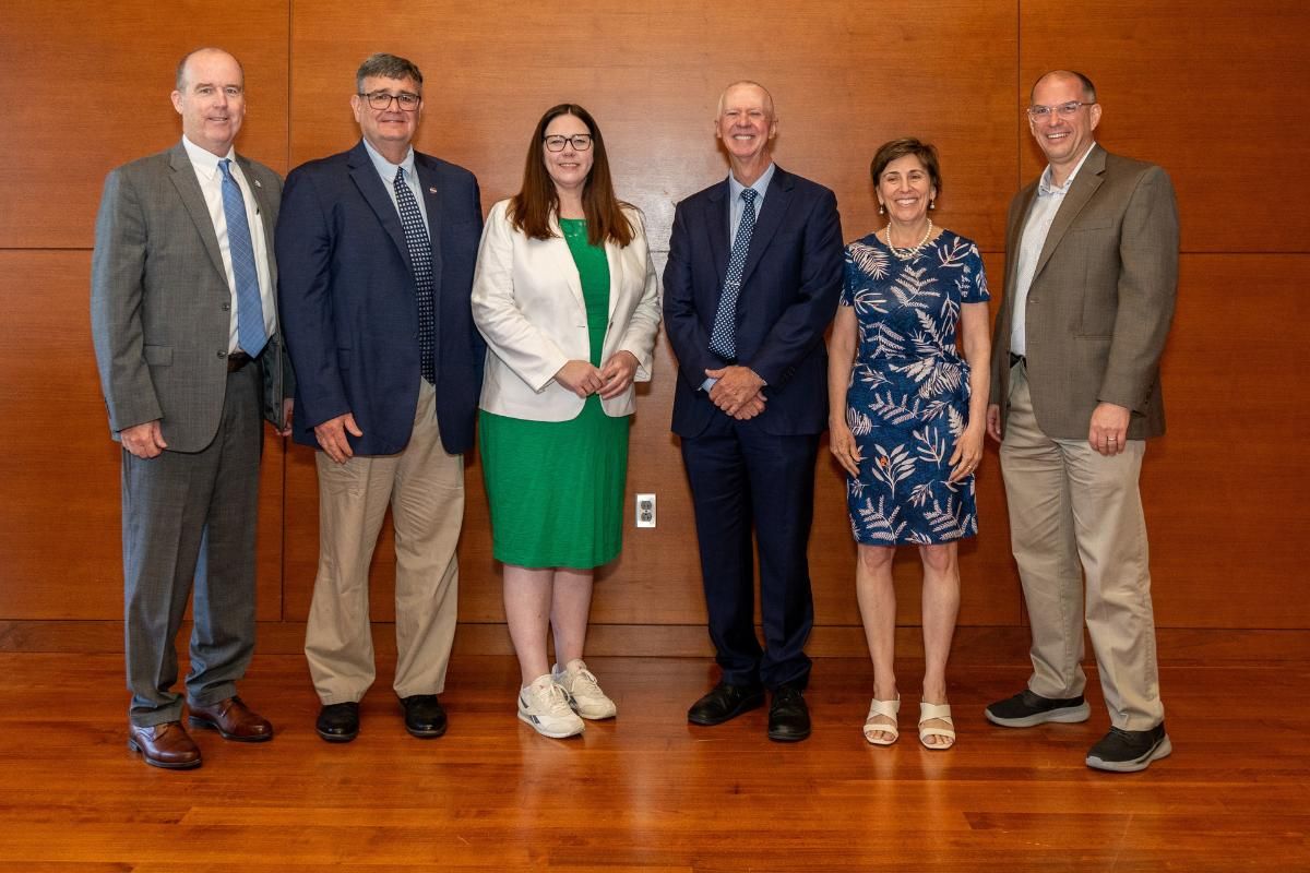 Group shot of university and state officials at a grant announcement
