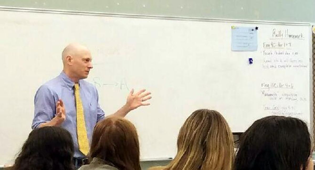 Law Professor Richard Peltz-Steele visits a classroom at Stonington High School, Connecticut