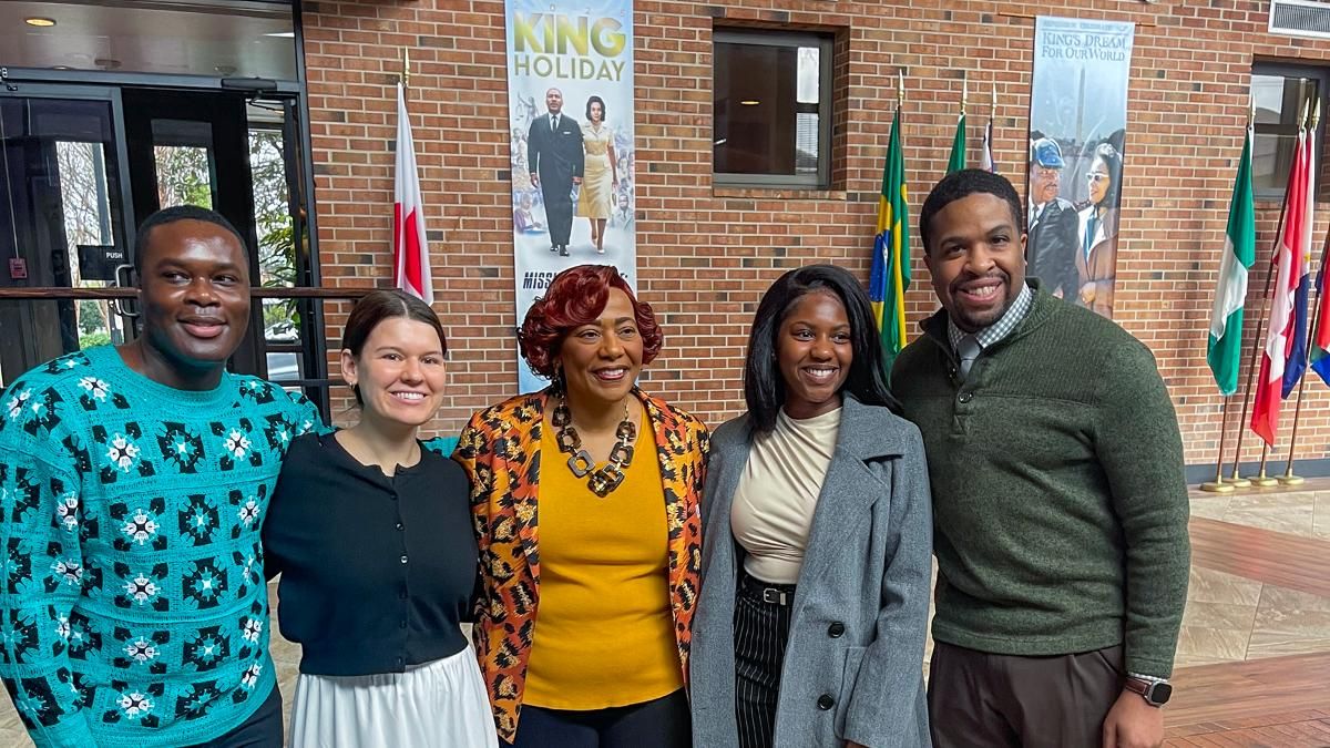 UMass Law students pose with Dr. Bernice King, CEO of The King Center and daughter of Dr. Martin Luther King Jr., during a visit to Atlanta as part of a civil rights study trip.