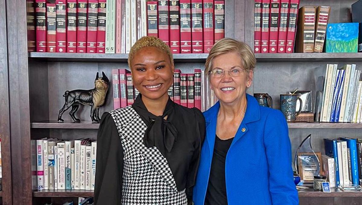 Efe Oboh-Idahosa pictures with U.S. Senator Elizabeth Warren