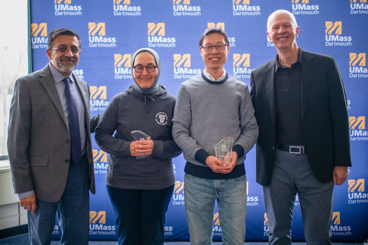 Dr. Shakhnoza Kayumova and Dr. Hangjian Ling pictured after receiving the National Distinction Award, joined by Dr. Ramprasad Balasubramanian and Chancellor Mark Fuller.