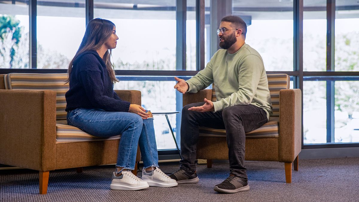 UMass Law students speaking to each other