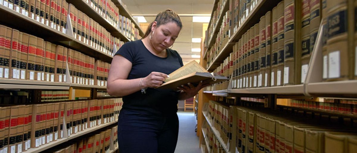 Law School student studying in the library