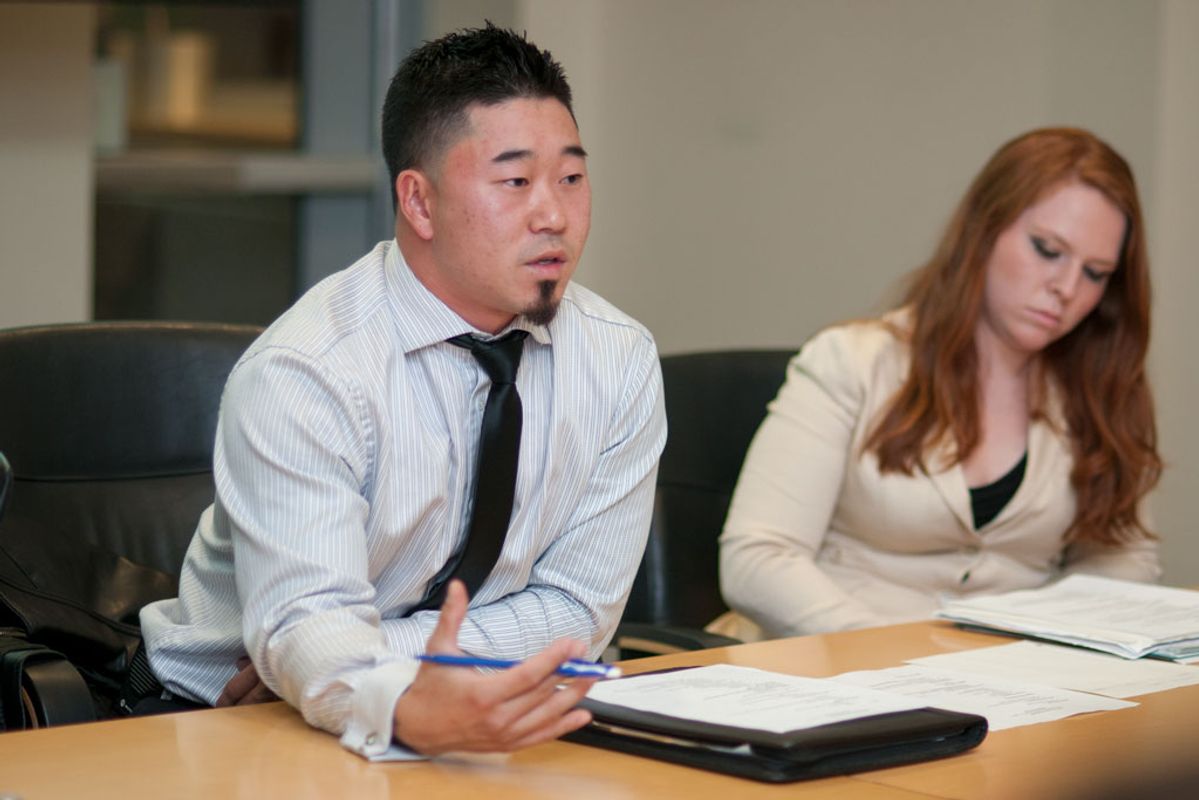 Enactus (SIFE) students conduct a meeting