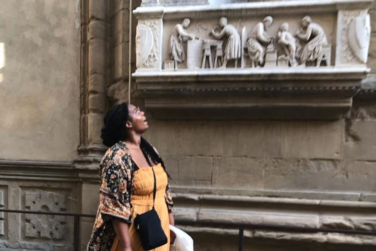 Adoria Kavuma-Winburn '23 poses at the Church and Museum of Orsanmichele in Florence Italy