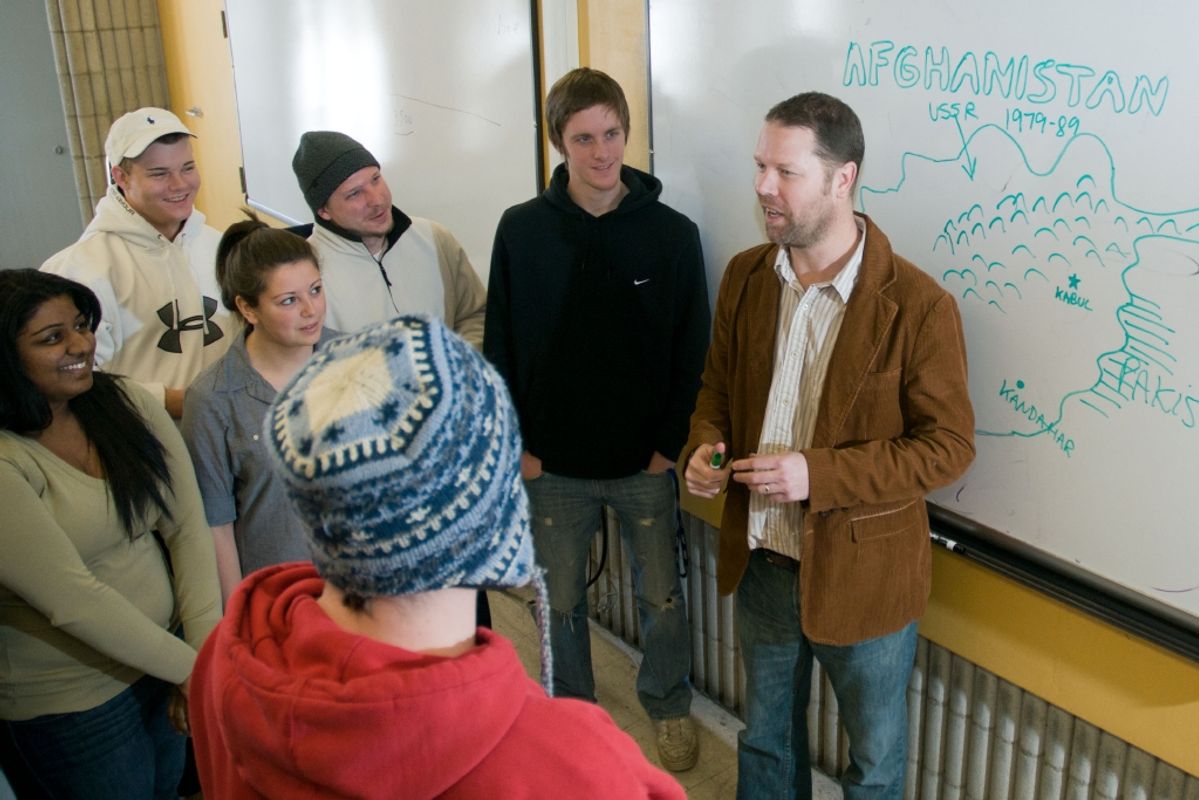 Brian Williams lecturing students