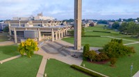 Exterior view of the Claire T. Carney Library and the campus quad
