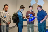 Hubei students receiving gifts
