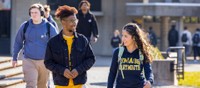 Students walking across the campus quad