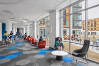 Students in one of the gathering lounges in Balsam Hall