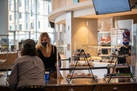 Student getting food at The Grove