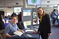 Jennifer Vincent visiting tables at a career fair