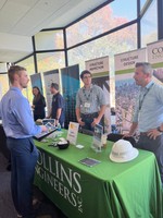 A student visiting a table at a career fair