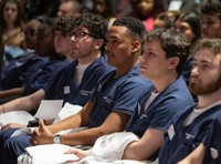 Seated students waiting for cloaking