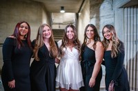 ABSN graduates gathering for a photo pre-ceremony