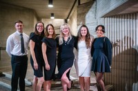 ABSN graduates gathering for a photo pre-ceremony