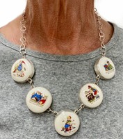 Mother Goose, 2021, antique buttons, sterling silver, cotton thread