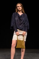 Cowl Top with Skirt, 2021, The cowl sleeves and neck create a different interpretation of layers. Finished with contoured cuffs and gold buttons. The fitted pencil skirt gives an elevated business feel.