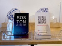 Business Card, 2022, Boston Uncommon branded business cards in exhibition presentation, 2 x 3.5 in
