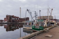 New Bedford 22, 2022, commercial fishing boat in front of the Eversource factory at New Bedford harbor, 11 x 17 archival pigment print