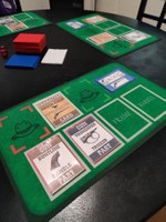 Out-Gunned Mat [View 2], (2023), black neoprene mat with class, blueprint and gun parts active with different camera angle, 11 x 17 in.