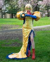 Galactic Bounty Hunter, 2024, evening dress inspired by Samus Aran from the Metroid series, red carpet wear designed for video game developers and gaming influencers.