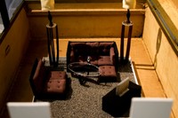 324 Broadway St. Fall River, 02721, 2025, vintage suitcase, wood, fabric, mixed media, 29 x 22 x 27 in.