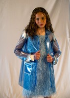 Look 4, 2026, blue shag-feathered dress under a blue vinyl raincoat with hood and silver faux-leather accents.