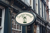 Sugarwood, 2026, logo with signage, 18.75 x 12.5 in.
