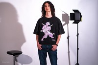 Analogue Purple, 2026, photo of screen printed sweater, 14 x 9 in.