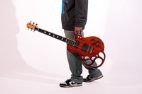 Chatterbox Guitar, 2026, photo of electric guitar, mahogany & maple wood, 14 x 9 in.