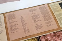 varied clarity: an index, 2021, handmade paper and ink, natural dye, cloth, reclaimed lumber, 7’ x 14’ installation. Photo credit: Hope Millham