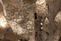 Enmeshed (detail), 2022, clay slip, cheese cloth, glue, led lights, wire, string, ~9’ x 10’ x 5’