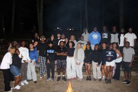 Students enjoying a campfire on the FDUH Leadership Retreat