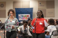 Student performing at S.P.E.A.K. event