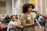 Student performing at S.P.E.A.K. event