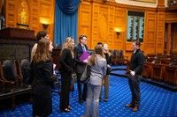 Riley and classmates tour the House Chamber at the Massachusetts State House.