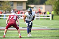 Alexander lines up across from an Anna Maria College right tackle in a fall 2025 away game.