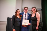 Riley is awarded the 'Unsung Hero' award at the 2025 Barrister's Ball.