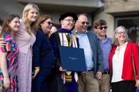 Sean Perrine pictured with family following the commencement ceremony.