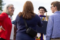 Sean Perrine pictured on the campus quad following the commencement ceremony.