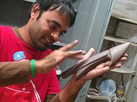 Person making harpoons