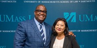 Judge Georges standing with UMass Law student Christina Suh at orientation dinner