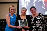 Assistant Vice Chancellor for Student Success Carol Spencer-Monteiro accepts an Award of Appreciation.