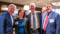 Left to right: UMass President Marty Meehan, UMass Trustee Julie Ramos Gagliardi '87, UMass Dartmouth Chancellor Mark Fuller, and UMassD Executive Director of Economic Development and Community Partnerships Michael Goodman.