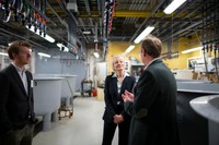 MassCEC CEO Emily Reichert and SMAST Dean Kevin Stokesbury in the seawater lab