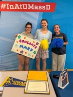 Mary Kudarauskas posing with friends