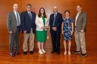 Group shot of university and state officials at a grant announcement