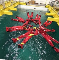 Students in survival suits in the test tank at SMAST