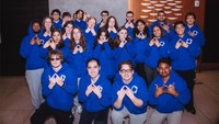 UMass Dartmouth Collegiate DECA members pictured in their custom DECA hoodies.